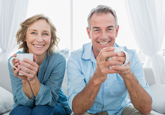 Happy couple drinking tea