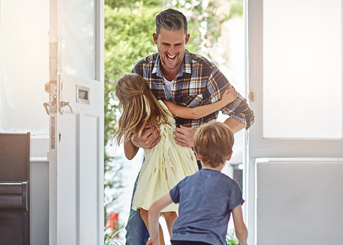 Dad arrives home after work